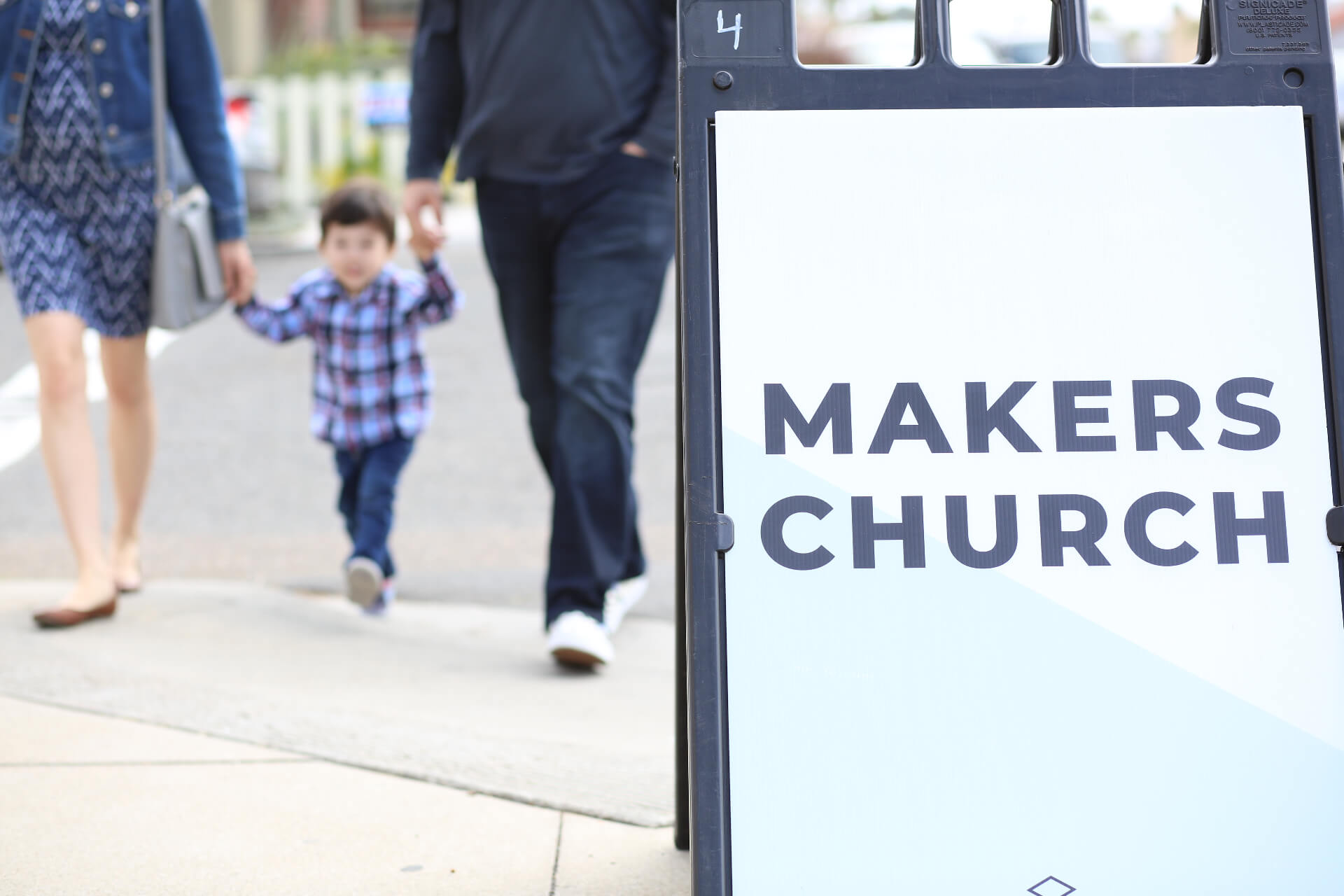 sign and child walking